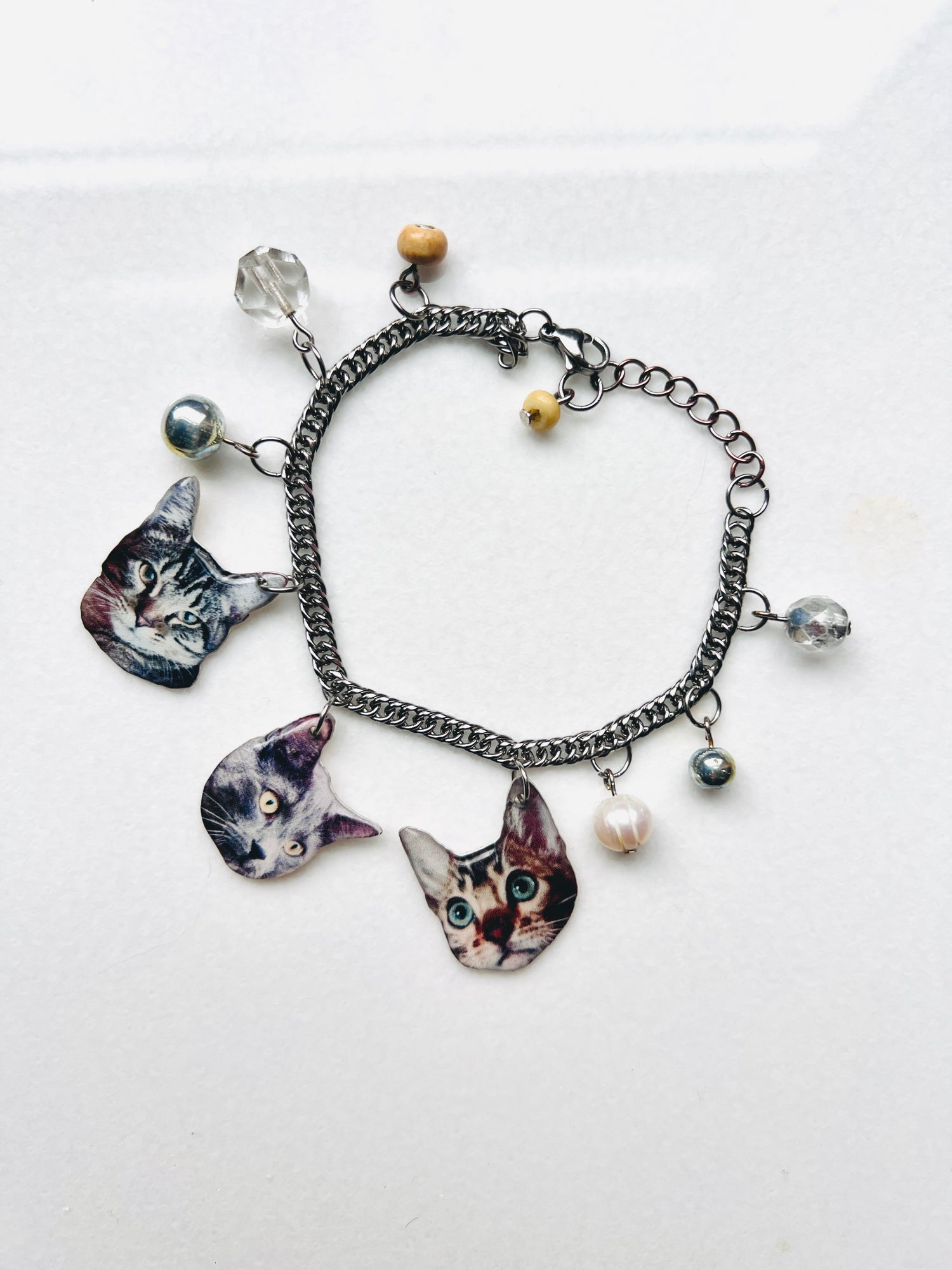 cat charms on a chain bracelet